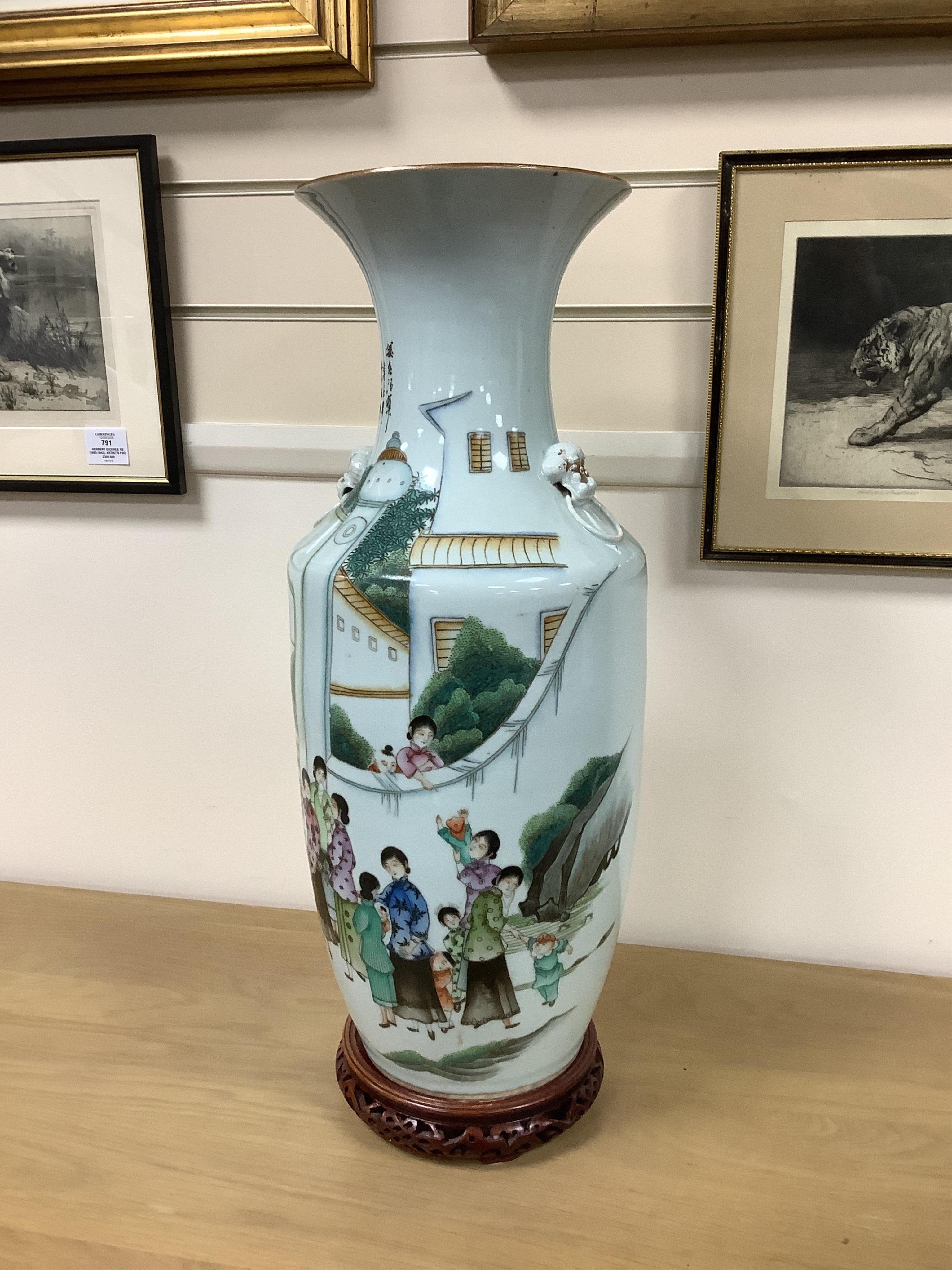 An early 20th century Chinese famille rose vase on stand. 57cm high. Condition - good